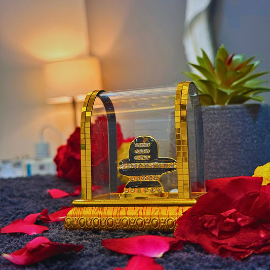 Divine Golden Shivling with Crystal Case – Spiritual Shivling Idol for Puja, Temple & Home Decor